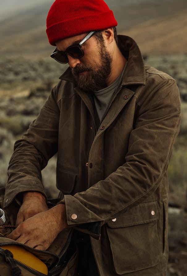 Man wearing Flint and Tinder Jacket in Sierra mountains