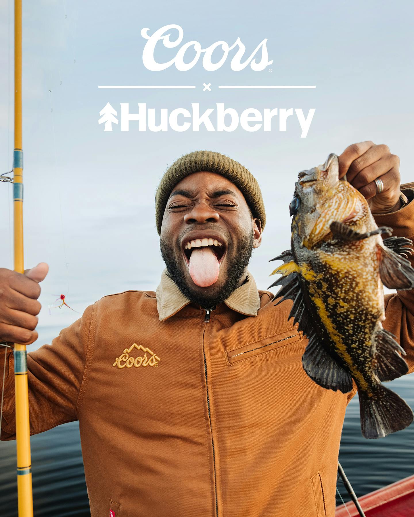 Coors x Huckberry lockup and man holding fish