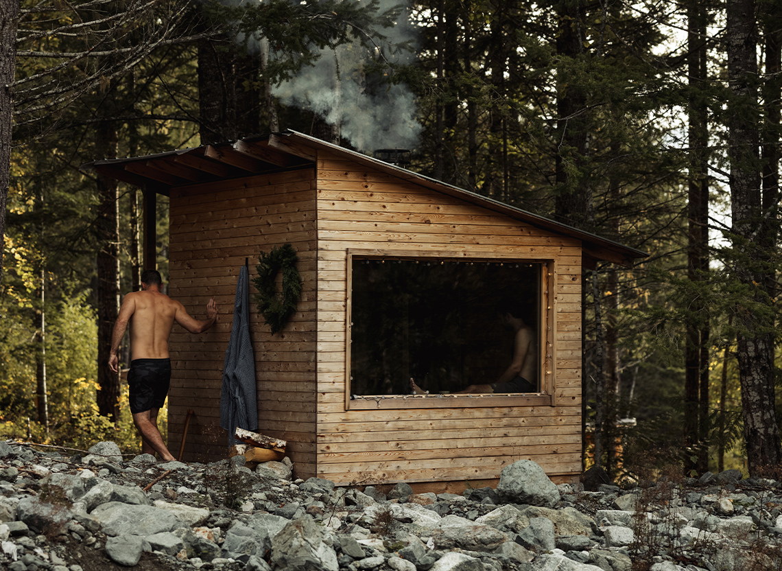 An aerial view of waves crashing against a shore.
