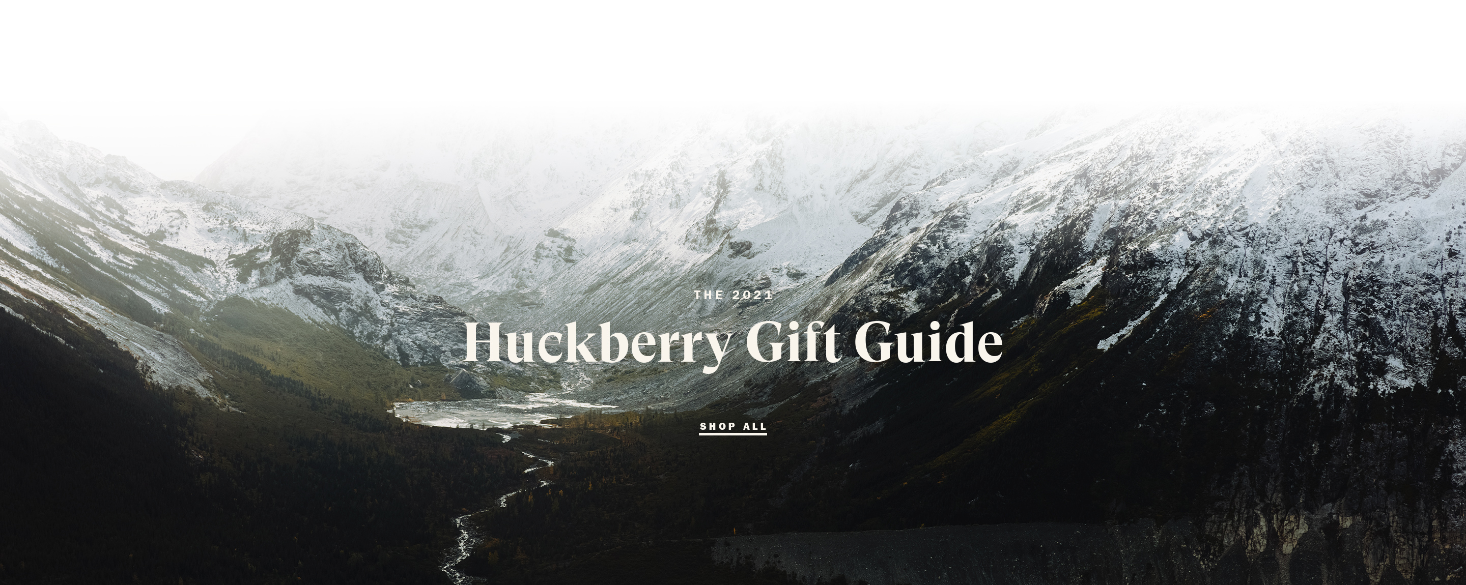 An aerial view of a field. A road runs through the upper right corner.