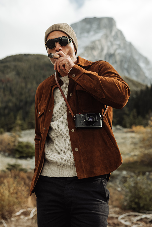 An aerial view of a field. A road runs through the upper right corner.
