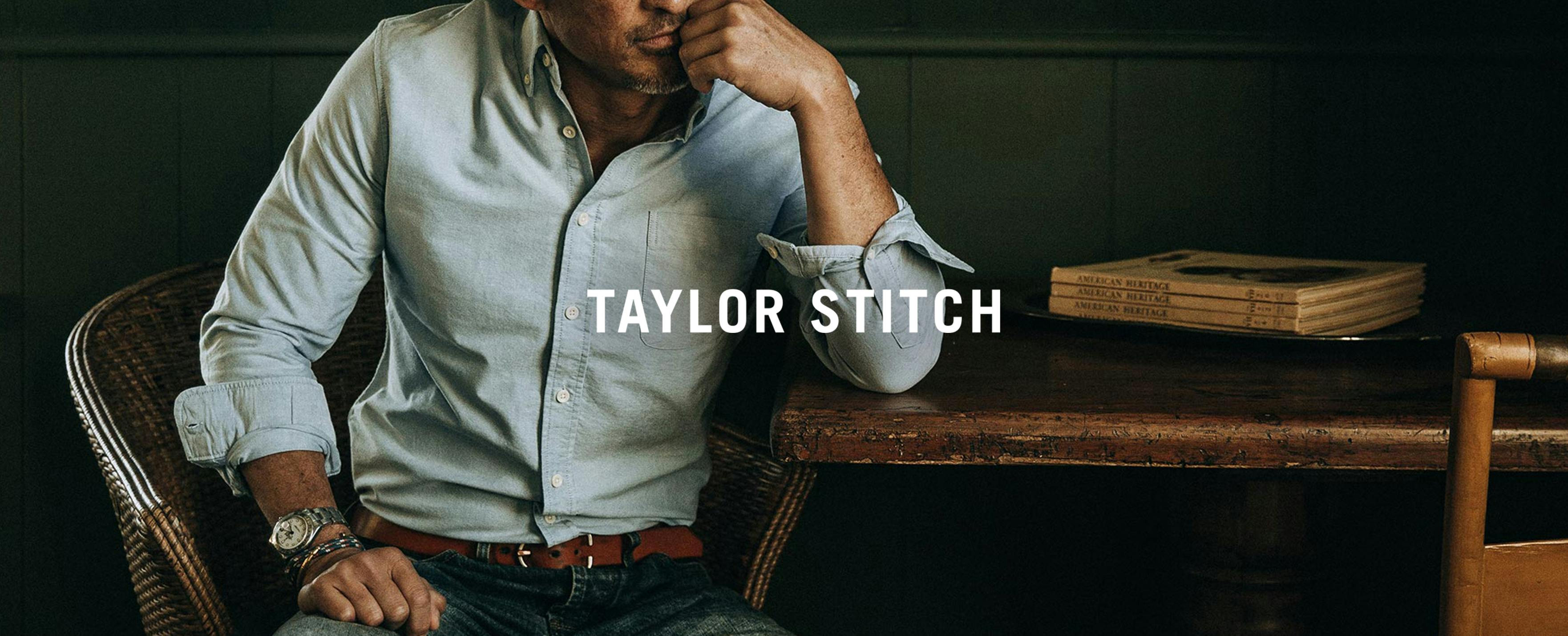 Taylor Stitch logo over image of man wearing button-up shirt