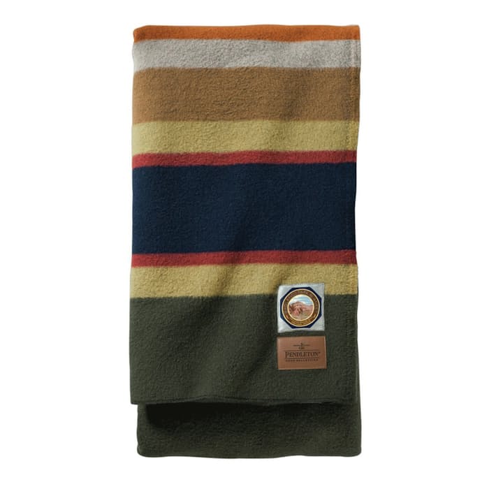 Shopping cart With a log cabin feel, the Pendleton plaid blanket is perfect for a bedroom or living room in the city, country, or lakeside. Created in a number of colors and patterns, newer plaid blankets by Pendleton are made with an earth-friendly fabric that boasts a lighter environmental impact.