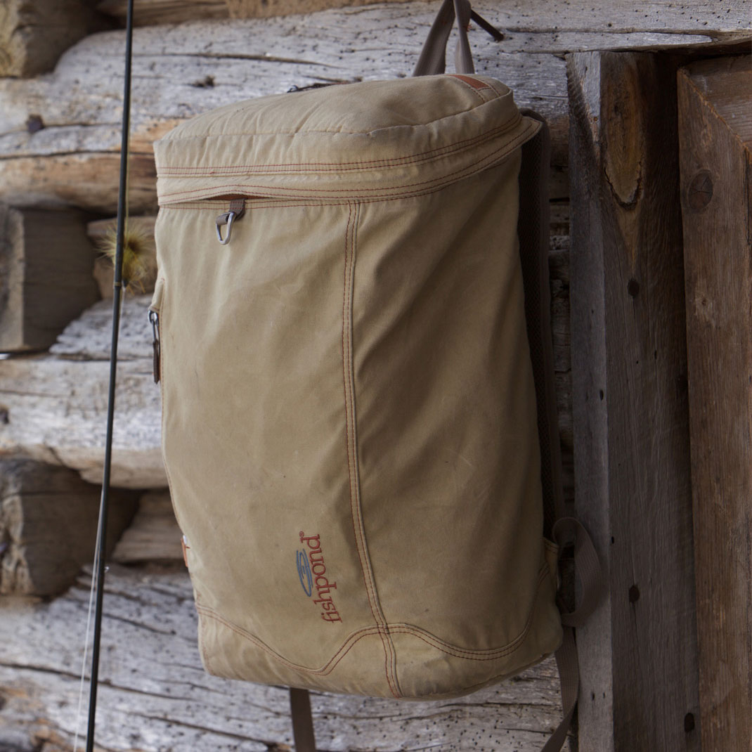 fishpond river bank backpack