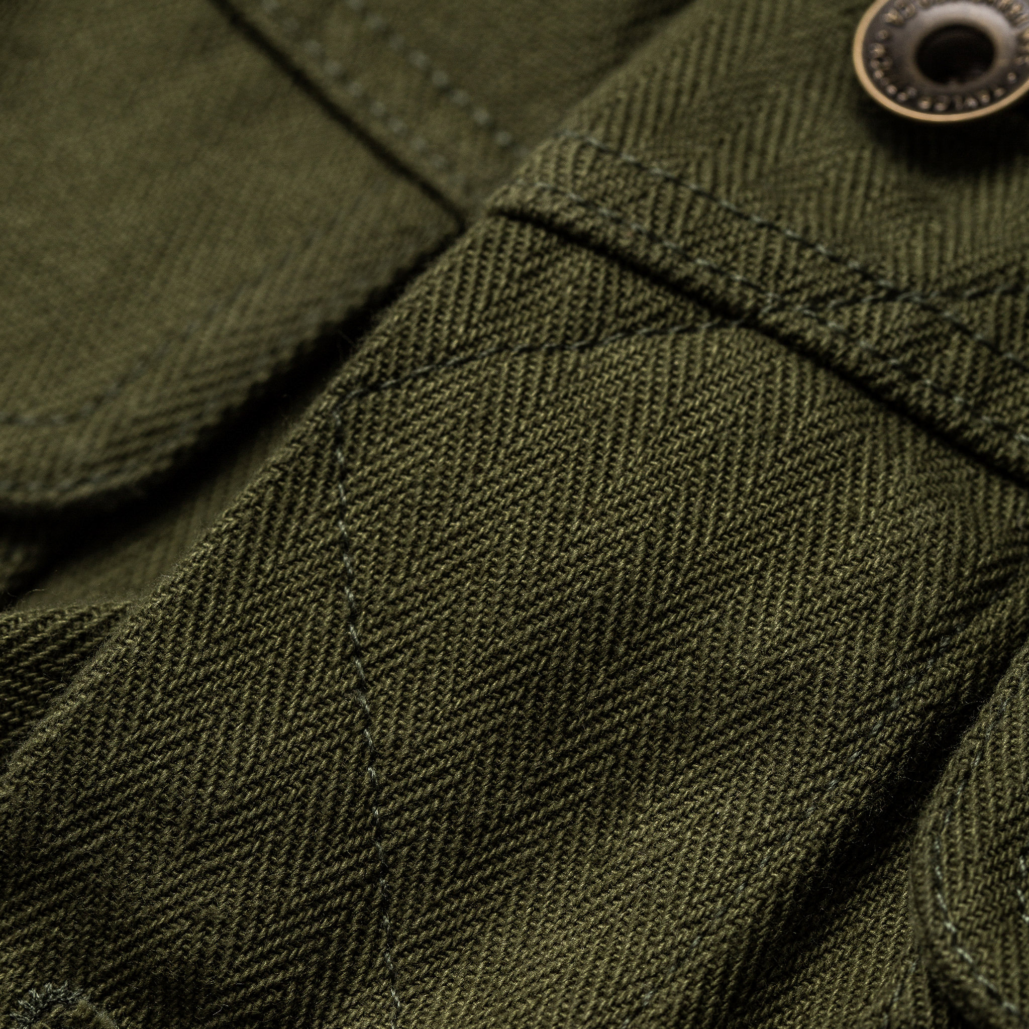 the long haul jacket in washed olive herringbone