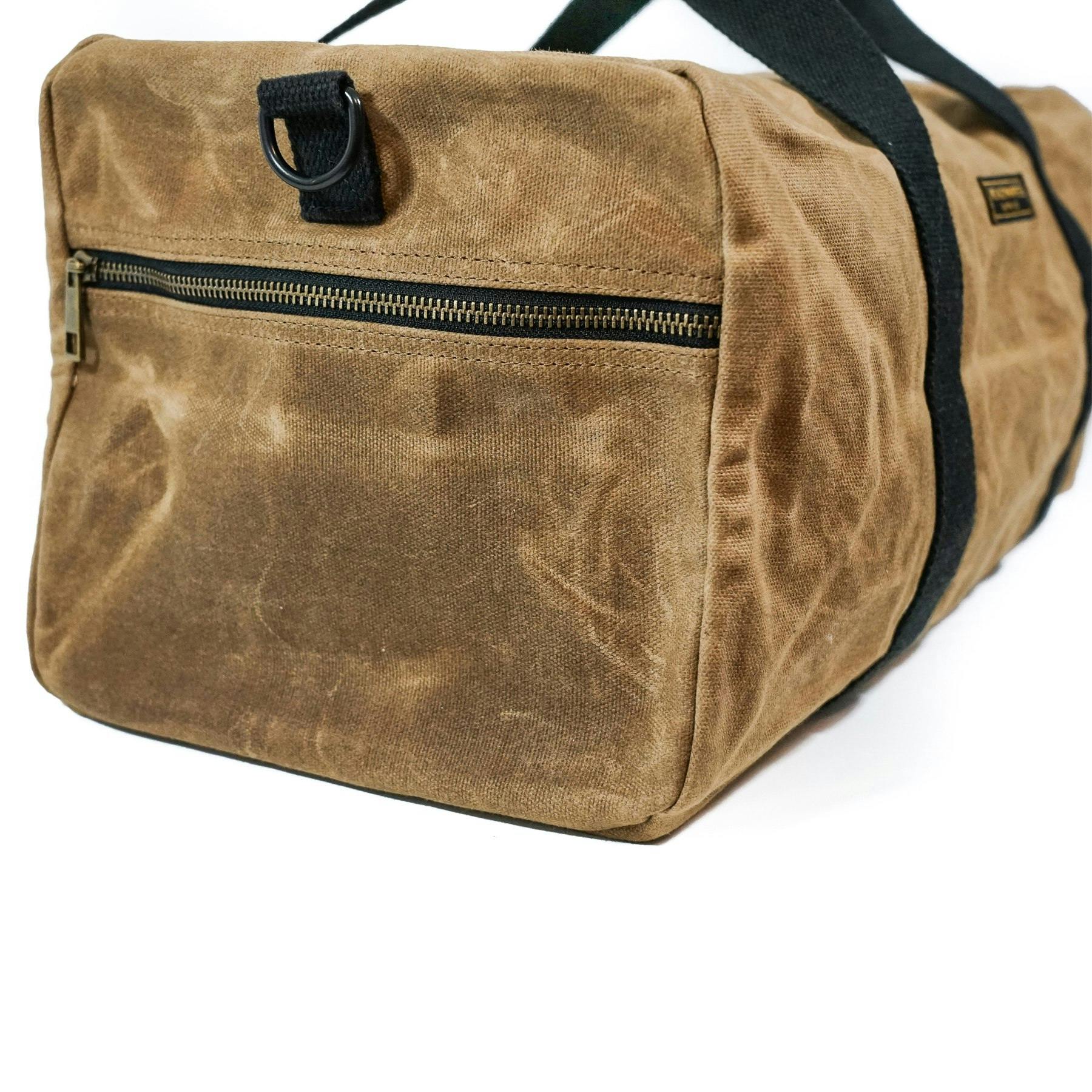 Huckberry Readywares Waxed Canvas Duffel Bag features high-quality