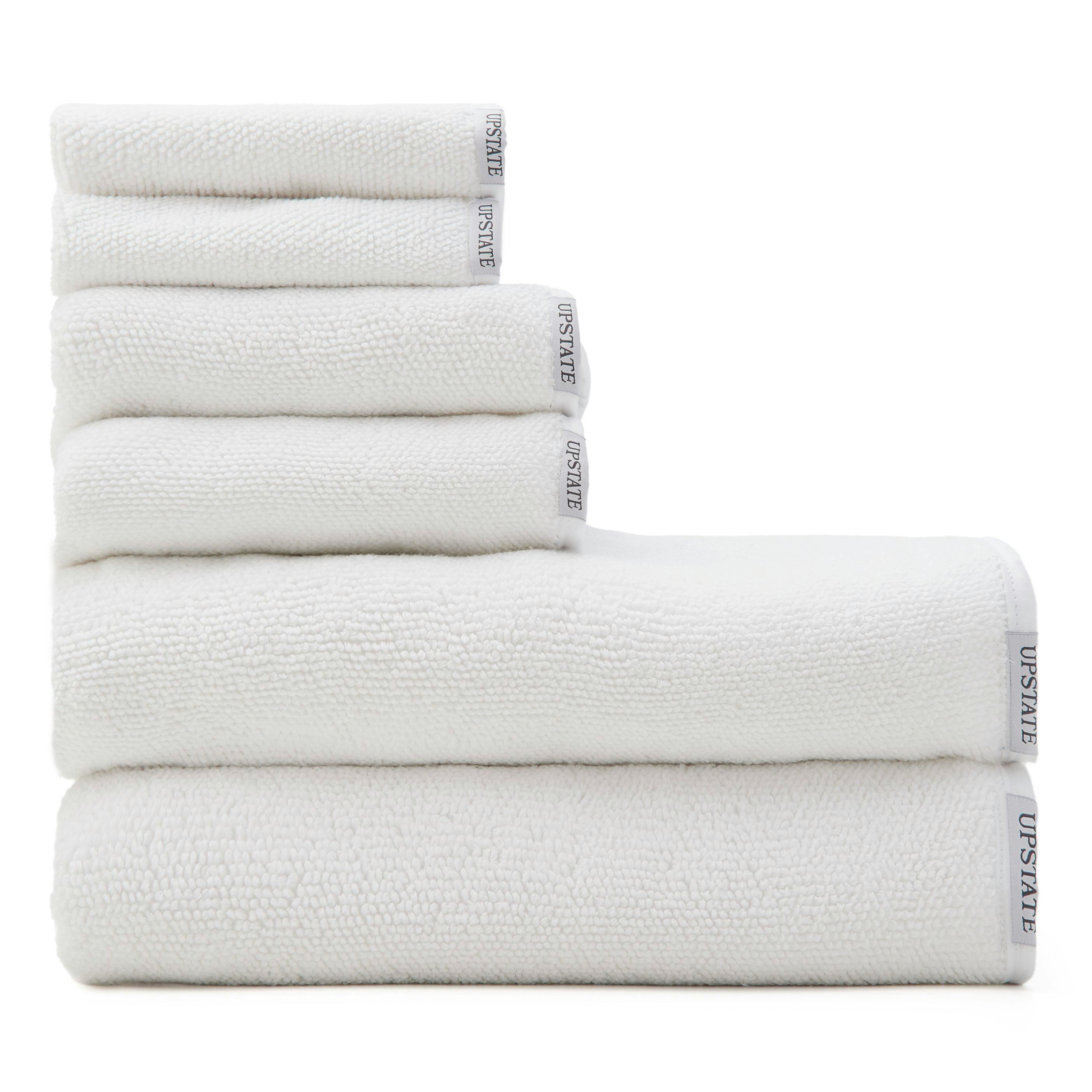 Premium Photo  Stack of fluffy towels in store background