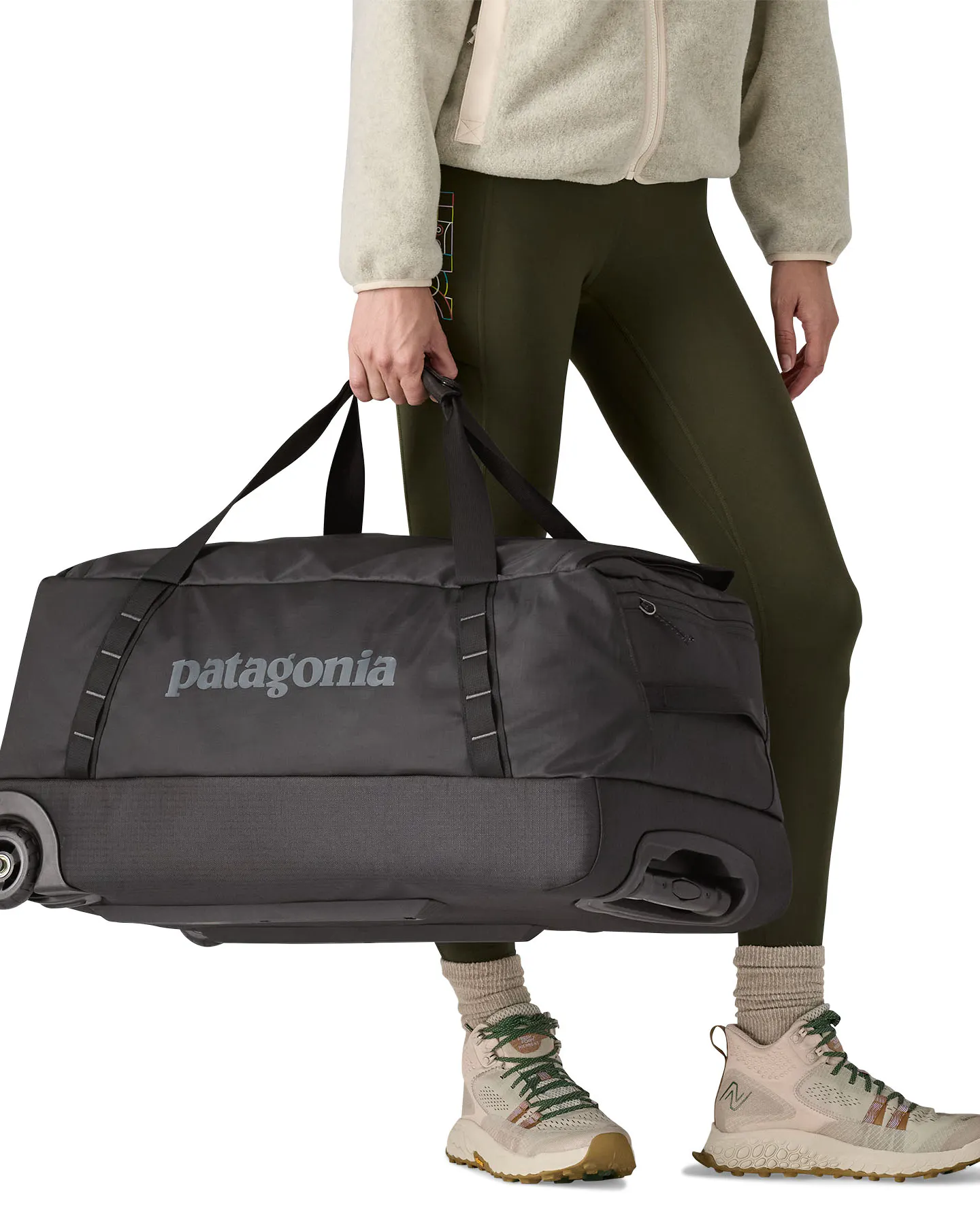 patagonia black hole with wheels MLC Wheelie Sports Basement The Patagonia 70L Black Hole Wheeled Duffel Bag is made of burly recycled polyester ripstop with a matte Patagonia Black Hole Wheeled Duffel