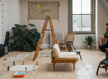 Tile with plenty of space spellman is able to utilize his studio to create his artwork and music as well as use the area as a gathering area for entertainment
